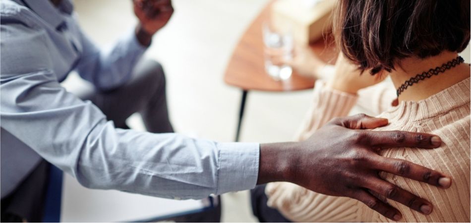 aftercare reassuring hand on shoulder