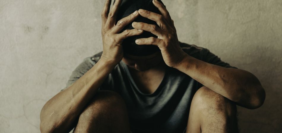 Young man suffring with Zaleplon addiction