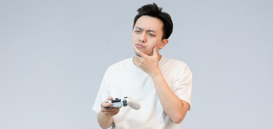 young man with gaming console